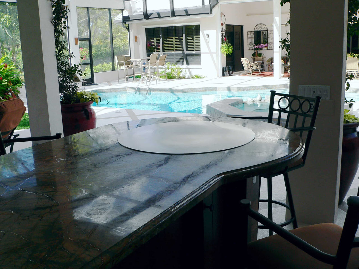 Cook N Dine UltraDine built-in teppanyaki grill installed in a poolside bench