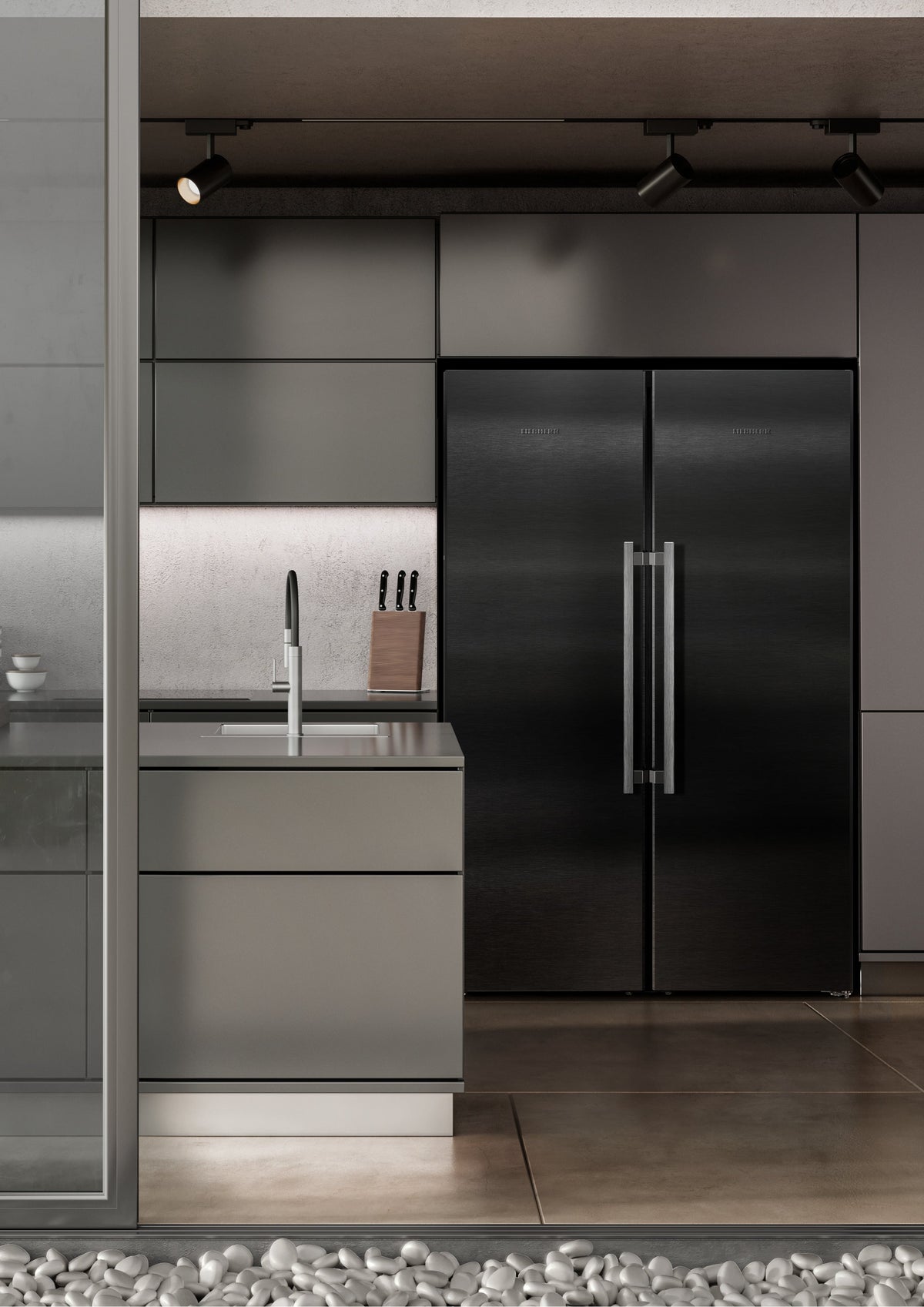 Liebherr XRFbsh 5265 BlackSteel side-by-side fridge-freezer styled in a modern kitchen