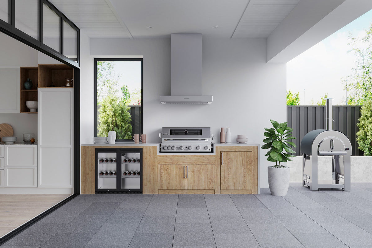 Smart 601WB built-in gas BBQ in a modern outdoor kitchen with rangehood and pizza oven