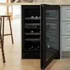 Artusi AWC37BV black wine cellar with the door open in a kitchen beside cabinetry