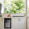 Artusi ABC1B bar fridge lifestyle - built into cabinetry in an entertaining space