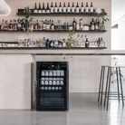 Artusi ABC1B bar fridge lifestyle - freestanding in a home bar