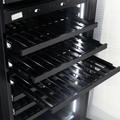 Artusi AWC154BV wine cellar, black wooden shelves pulled out under white LED lighting