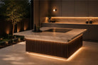 Cook N Dine built-in teppanyaki grill in an outdoor kitchen bench at night