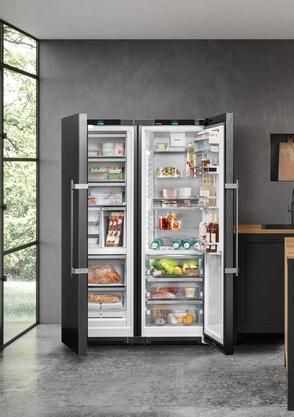 Liebherr XRFbsh 5265 BlackSteel side-by-side fridge-freezer in a contemporary kitchen