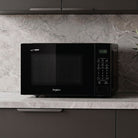 Whirlpool MWP421IB black microwave lifestyle image