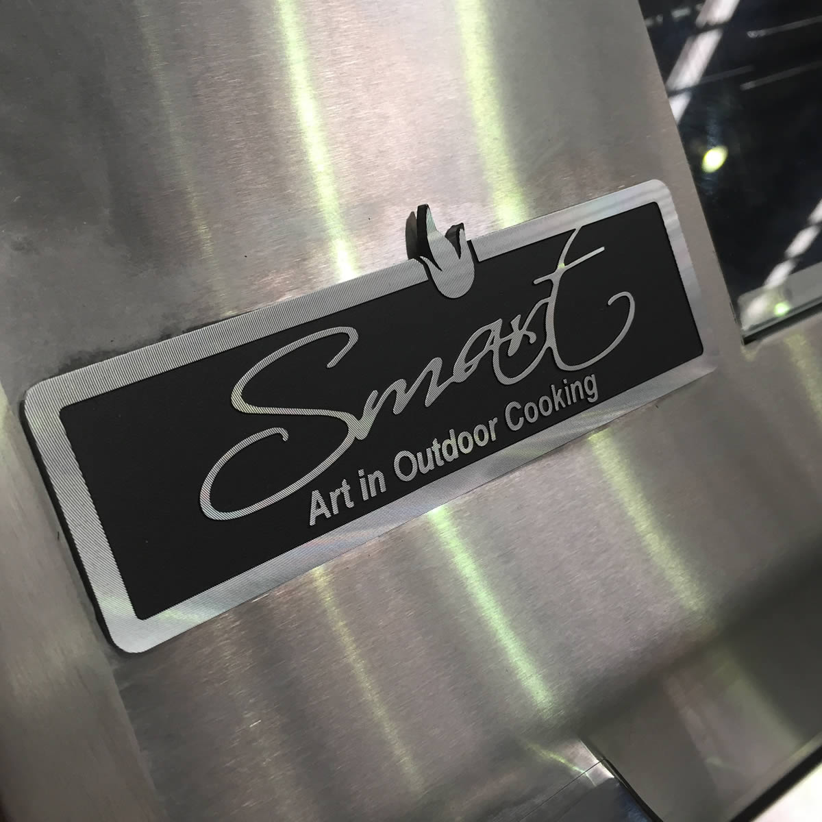 Close-up of the Smart badge on the 601WB stainless steel hood