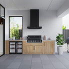 Smart black built-in gas BBQ under a black rangehood in an enclosed alfresco kitchen with timber cabinetry and a wine fridge