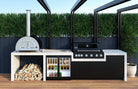 Smart PW01 pizza oven built into an outdoor kitchen benchtop with wood storage and Smart BBQ