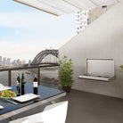 Smart WM700EW wall mounted electric BBQ on an apartment balcony overlooking a harbour bridge