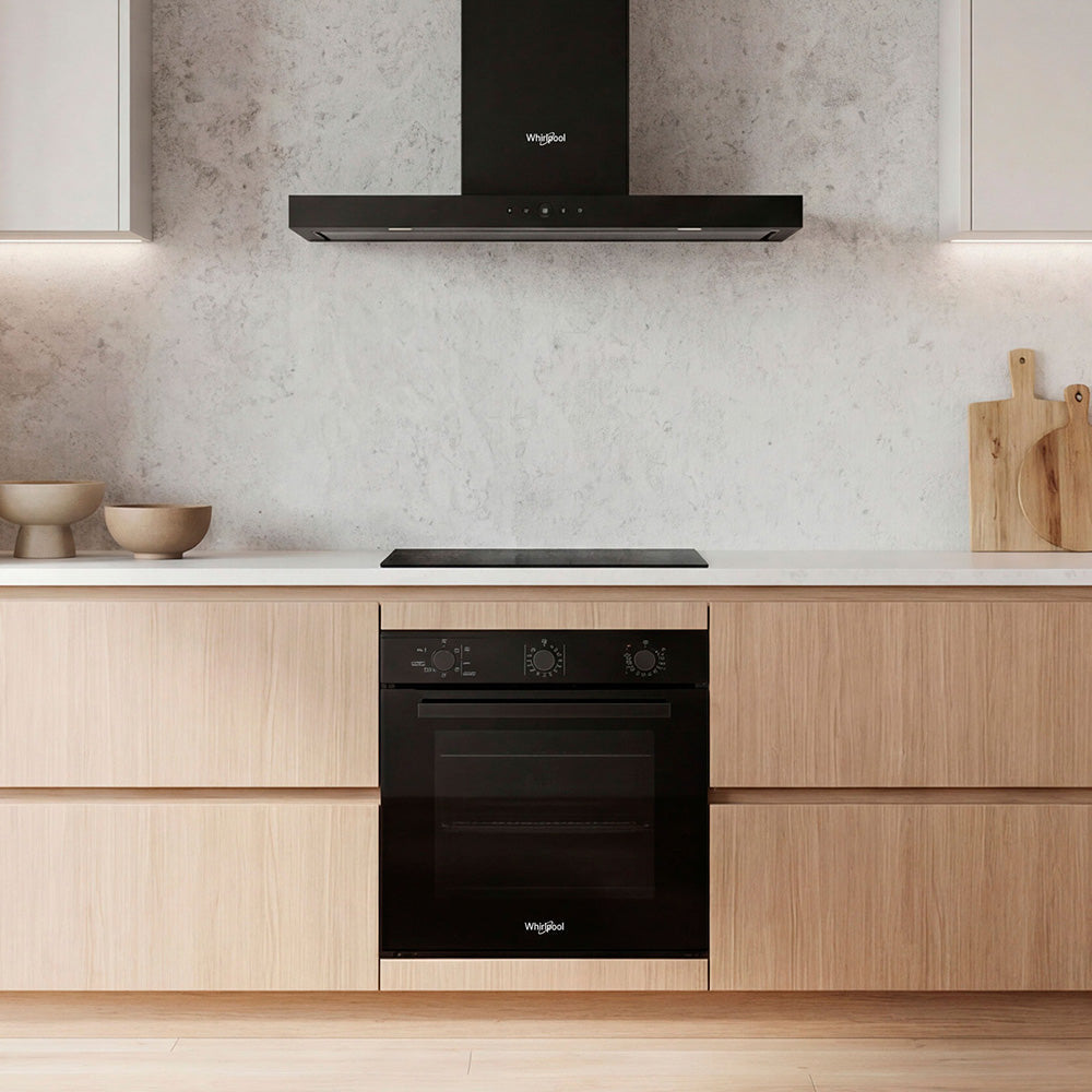 Whirlpool W3OMK35HR0BA black oven in a kitchen setting