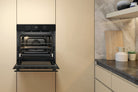 Whirlpool W4OMK581HU1BAUS black oven front view with door open in a kitchen