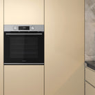 Whirlpool W4OMK581RU1XA stainless steel oven in a kitchen setting