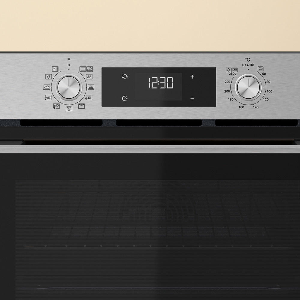 Whirlpool W4OMK581RU1XA stainless steel oven lifestyle image