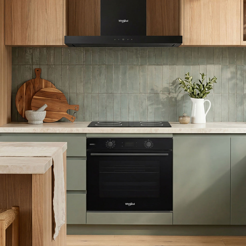 Whirlpool W4OMSK581RU1SBA black steam oven installed in a kitchen