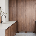 Panel ready integrated column freezer built into timber kitchen cabinetry