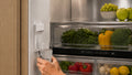 Artusi AINT9100FDIW 90cm integrated French door refrigerator freezer with ice and water - lifestyle image 1
