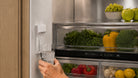 Artusi AINT9100FDIW 90cm integrated French door refrigerator freezer with ice and water - lifestyle image 1
