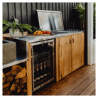 Artusi outdoor beverage chiller built into a timber outdoor kitchen beside a BBQ